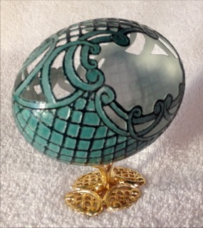 "Emerald Treasure" - An Emu egg carved by Katy Wilson