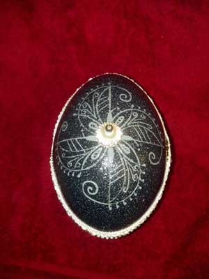 "Four Winds Jewelry Box" - An Emu egg carved by Rebecca Perry