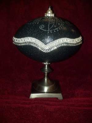 "Four Winds Jewelry Box" - An Emu egg carved by Rebecca Perry